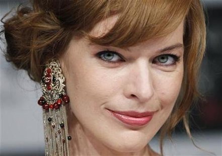 
Actress Milla Jovovich attends a news conference to promote her movie "Resident Evil: Afterlife 3D" in Tokyo September 3, 2010. REUTERS/Toru Hanai
