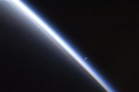 A setting last quarter crescent moon and the thin line of Earth's atmosphere are photographed by an Expedition 24 crew member as the International Space Station passes over central Asia September 4, 2010 in this NASA handout photo obtained September 10, 2010. Picture taken September 4, 2010. REUTERS/NASA/Handout THIS IMAGE HAS BEEN SUPPLIED BY A THIRD PARTY. IT IS DISTRIBUTED, EXACTLY AS RECEIVED BY REUTERS, AS A SERVICE TO CLIENTS. FOR EDITORIA
A setting last quarter crescent moon and the thin line of Earth's atmosphere are photographed by an Expedition 24 crew member as the International Space Station passes over central Asia September 4, 2010 in this NASA handout photo obtained September 10, 2010. Picture taken September 4, 2010. REUTERS/NASA/Handout THIS IMAGE HAS BEEN SUPPLIED BY A THIRD PARTY. IT IS DISTRIBUTED, EXACTLY AS RECEIVED BY REUTERS, AS A SERVICE TO CLIENTS. FOR EDITORIA