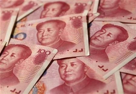 
Yuan banknotes are seen in this illustrative photograph taken in Beijing September 19, 2010. REUTERS/Petar Kujundzic

