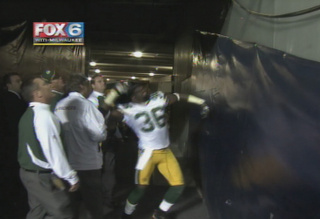 Video from Milwaukee's WITI shows Nick Collins yelling at a fan as he left the field. Collins then appears to throw his mouthpiece into the stands.
Video from Milwaukee's WITI shows Nick Collins yelling at a fan as he left the field. Collins then appears to throw his mouthpiece into the stands.