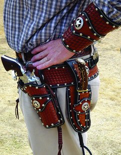 Gun in holster. Gun in holster.