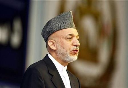 
Afghanistan's President Hamid Karzai speaks during the opening ceremony of the peace jirga in Kabul in this June 2, 2010 file photo. REUTERS/Omar Sobhani
