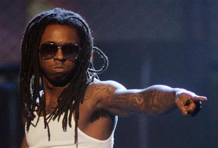 Rap artist Lil Wayne performs at the Second Annual BET Awards in Atlanta, Georgia, October 13, 2007. REUTERS/Tami Chappell
Rap artist Lil Wayne performs at the Second Annual BET Awards in Atlanta, Georgia, October 13, 2007. REUTERS/Tami Chappell