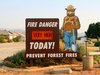 A sign indicating fire danger is very high.