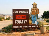 A sign indicating fire danger is very high.