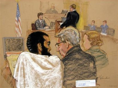 
In this courtroom sketch, Canadian defendant Omar Khadr (L) attends the first day of his hearing in the courthouse for the U.S. military war crimes commission at the Camp Justice compound on Guantanamo Bay U.S. Naval Base in Cuba August 9, 2010. REUTERS/Janet Hamlin/Pool

