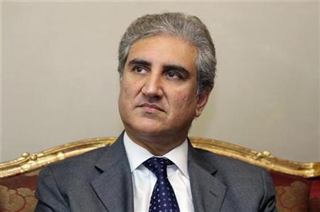 
Pakistan's Foreign Minister Shah Mehmood Qureshi attends a news conference during his official visit in Doha September 2, 2010. REUTERS/Fadi Al-Assaad
