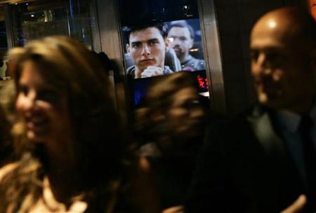 An image of Tom Cruise from the movie "Top Gun" is reflected in a window as people arrive at the Museum of the Moving Image Salute to Tom Cruise in New York November 6, 2007. REUTERS/Shannon Stapleton
An image of Tom Cruise from the movie "Top Gun" is reflected in a window as people arrive at the Museum of the Moving Image Salute to Tom Cruise in New York November 6, 2007. REUTERS/Shannon Stapleton
