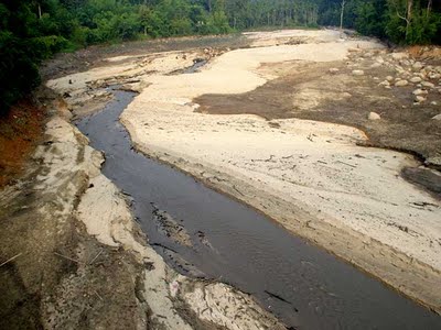 A dry river bed because of drought conditions. A dry river bed because of drought conditions.