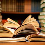 School books in a school library. School books in a school library.