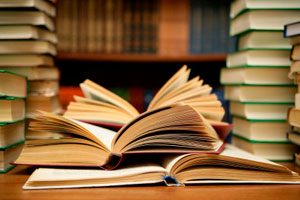 School books in a school library. School books in a school library.