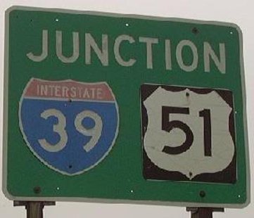 An exit sign on I-39. An exit sign on I-39.