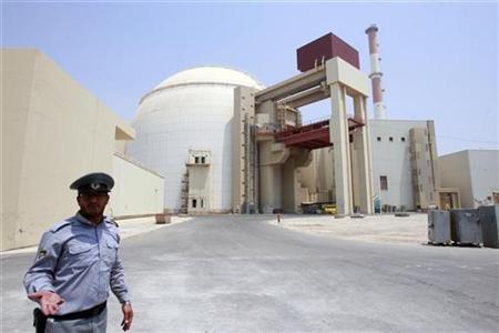EDITORS' NOTE: Reuters and other foreign media are subject to Iranian restrictions on leaving the office to report, film or take pictures in Tehran. A security official talks to journalists in front of Bushehr main nuclear reactor, 1,200 km (746 miles) south of Tehran, August 21, 2010. REUTERS/Raheb Homavandi
EDITORS' NOTE: Reuters and other foreign media are subject to Iranian restrictions on leaving the office to report, film or take pictures in Tehran. A security official talks to journalists in front of Bushehr main nuclear reactor, 1,200 km (746 miles) south of Tehran, August 21, 2010. REUTERS/Raheb Homavandi