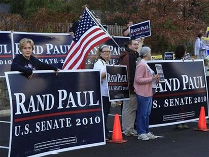 Campaign supporters and volunteers cheer for their candidates before the last of four debates between Democratic Senate candidate Jack Conway and Republican Senate candidate Rand Paul at the Kentucky Education Television network headquarters in Lexington, Kentucky October 25, 2010. REUTERS/John Sommers II
Campaign supporters and volunteers cheer for their candidates before the last of four debates between Democratic Senate candidate Jack Conway and Republican Senate candidate Rand Paul at the Kentucky Education Television network headquarters in Lexington, Kentucky October 25, 2010. REUTERS/John Sommers II