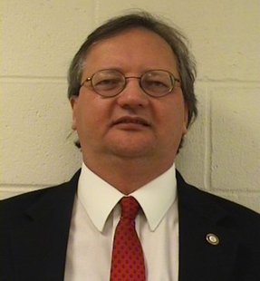 Wausau attorney Ronald Moore is accused of trying to get a client to buy marijuana for him in February 2010. (Photo courtesy: Marathon County jail) Wausau attorney Ronald Moore is accused of trying to get a client to buy marijuana for him in February 2010. (Photo courtesy: Marathon County jail)