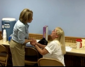 Democratic congressional candidate Julie Lassa, left, thanks a volunteer at the Labor Temple in Wausau.