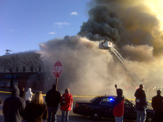 Crews fight a fire at West Side Liquor in Green Bay, Nov. 5, 2010. (courtesy of FOX 11) Crews fight a fire at West Side Liquor in Green Bay, Nov. 5, 2010. (courtesy of FOX 11)