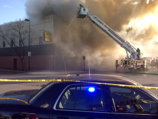Green Bay firefighters work to put out a blaze at Super Saver Liquor on W. Walnut St. on November 5, 2010. (Courtesy of FOX 11). Green Bay firefighters work to put out a blaze at Super Saver Liquor on W. Walnut St. on November 5, 2010. (Courtesy of FOX 11).