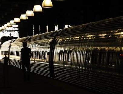 
A passenger walks on the platform beside an Amtrak train in a file photo. REUTERS/Brian Snyder
