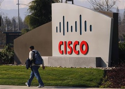 A pedestrian walks past the Cisco logo at the technology company's campus in San Jose, California February 3, 2010. REUTERS/Robert Galbraith
A pedestrian walks past the Cisco logo at the technology company's campus in San Jose, California February 3, 2010. REUTERS/Robert Galbraith