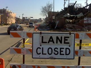 A lane of Walnut St. in Green Bay remains closed Nov. 9, 2010, four days after a massive fire destroyed a building. (courtesy of FOX 11). A lane of Walnut St. in Green Bay remains closed Nov. 9, 2010, four days after a massive fire destroyed a building. (courtesy of FOX 11).