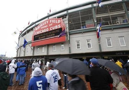 
Fans arrive for the Chicago Cubs, Colorado Rockies opening day MLB baseball game at Wrigley Field in Chicago in this April 13, 2009 file photo. REUTERS/John Gress

