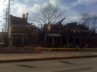 Fire officials are waiting for insurance investigators and proper machinery to arrive before entering the building burned on Green Bay's west side Friday November 5, 2010. (courtesy of FOX 11).
Fire officials are waiting for insurance investigators and proper machinery to arrive before entering the building burned on Green Bay's west side Friday November 5, 2010. (courtesy of FOX 11).