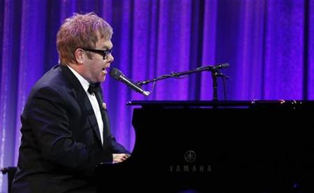 Singer Elton John performs during a fundraising benefit for the Elton John Aids Foundation in New York October 18, 2010. REUTERS/Lucas Jackson
Singer Elton John performs during a fundraising benefit for the Elton John Aids Foundation in New York October 18, 2010. REUTERS/Lucas Jackson