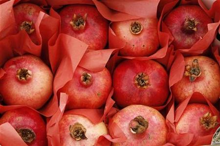 
Produce for sale are displayed during the third Jordanian Pomegranate Fair in Amman October 14, 2010. REUTERS/Muhammad Hamed
