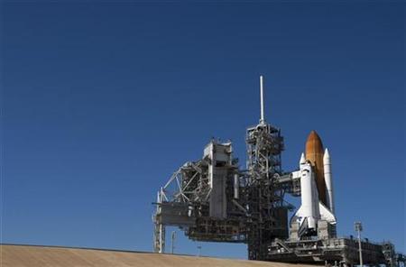Space shuttle Discovery STS-133 sits on launch pad 39A at the Kennedy Space Center in Cape Canaveral, Florida November 5, 2010. REUTERS/Scott Audette
Space shuttle Discovery STS-133 sits on launch pad 39A at the Kennedy Space Center in Cape Canaveral, Florida November 5, 2010. REUTERS/Scott Audette