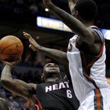 Miami Heat's LeBron James (6) goes up for a basket against the defense of the Milwaukee Bucks in the first half during their NBA basketball game in Milwaukee, Wisconsin December 6, 2010. REUTERS/Darren Hauck
Miami Heat's LeBron James (6) goes up for a basket against the defense of the Milwaukee Bucks in the first half during their NBA basketball game in Milwaukee, Wisconsin December 6, 2010. REUTERS/Darren Hauck