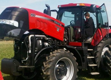 An NTC ag sciences student looks over a new Case IH tractor. The college, Case IH and Service Motor Company signed a 10-year partnership April 14, 2010, that will provide ag science students with the latest Case IH farm equipment An NTC ag sciences student looks over a new Case IH tractor. The college, Case IH and Service Motor Company signed a 10-year partnership April 14, 2010, that will provide ag science students with the latest Case IH farm equipment