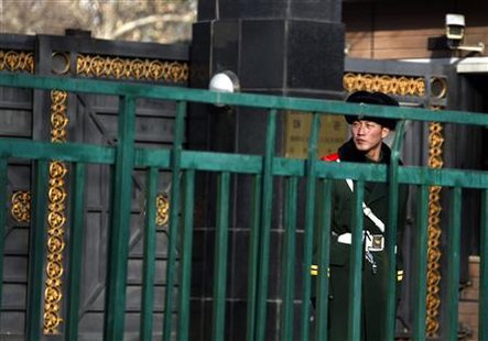 A paramilitary policeman stands guard outside the main gate of the North Korean embassy in central Beijing December 15, 2010. REUTERS/David Gray
A paramilitary policeman stands guard outside the main gate of the North Korean embassy in central Beijing December 15, 2010. REUTERS/David Gray