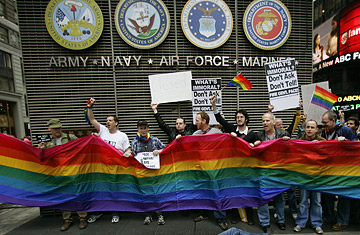Demonstrators protest the military's Don't Ask, Don't Tell policy at a New York recruitment center. (Photo courtesy of Time.com/Getty). Demonstrators protest the military's Don't Ask, Don't Tell policy at a New York recruitment center. (Photo courtesy of Time.com/Getty).
