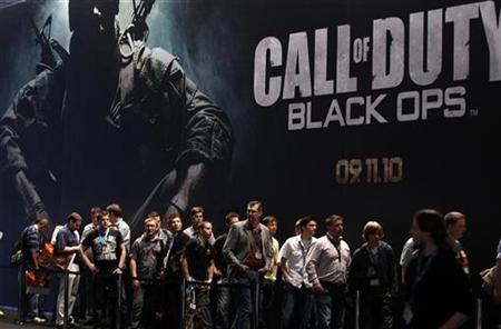 Visitors wait at an exhibition stand for 'Call of Duty - Black Ops' at the Gamescom 2010 fair in Cologne in this August 18, 2010 file photo. REUTERS/Ina Fassbender
Visitors wait at an exhibition stand for 'Call of Duty - Black Ops' at the Gamescom 2010 fair in Cologne in this August 18, 2010 file photo. REUTERS/Ina Fassbender
