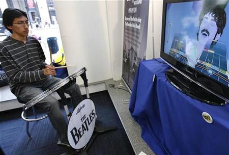 A man plays "The Beatles: Rock Band" game during its launch in New York, September 9, 2009. REUTERS/Shannon Stapleton
A man plays "The Beatles: Rock Band" game during its launch in New York, September 9, 2009. REUTERS/Shannon Stapleton