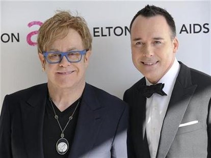 Singer Elton John (L) and partner David Furnish arrive at the 18th Annual Elton John AIDS Foundation Academy Award Viewing Party in West Hollywood, California March 7, 2010. REUTERS/Gus Ruelas
Singer Elton John (L) and partner David Furnish arrive at the 18th Annual Elton John AIDS Foundation Academy Award Viewing Party in West Hollywood, California March 7, 2010. REUTERS/Gus Ruelas