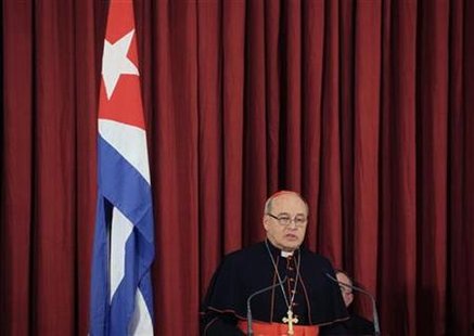 
Cuban Catholic leader Cardinal Jaime Ortega speaks during the opening ceremony of a new seminary on the outskirts of Havana November 3, 2010. REUTERS/Desmond Boylan
