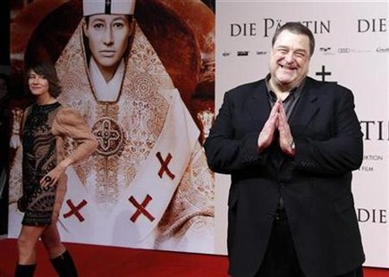 Actors Johanna Wokalek of Germany (L) and John Goodman of the U.S. pose for pictures as they arrive for the world premier of the movie "Die Paepstin" (Pope Joan) in Berlin October 19, 2009. REUTERS/Thomas Peter
Actors Johanna Wokalek of Germany (L) and John Goodman of the U.S. pose for pictures as they arrive for the world premier of the movie "Die Paepstin" (Pope Joan) in Berlin October 19, 2009. REUTERS/Thomas Peter