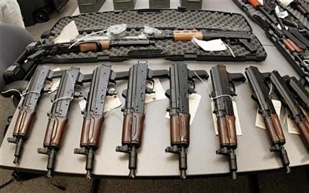 AK-47 short pistols, part of a weapons shipment seized by the Bureau of Alcohol, Tobacco, Firearms and Explosives (ATF), are laid out on a table at the bureau's Arizona headquarters in Phoenix, Arizona January 14, 2008. REUTERS/Jeff Topping
AK-47 short pistols, part of a weapons shipment seized by the Bureau of Alcohol, Tobacco, Firearms and Explosives (ATF), are laid out on a table at the bureau's Arizona headquarters in Phoenix, Arizona January 14, 2008. REUTERS/Jeff Topping