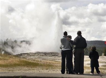 President Barack Obama, and his family visit the Old Faithful Geyser in Yellowstone National Park in Wyoming, August 15, 2009. REUTERS/Larry Downing
President Barack Obama, and his family visit the Old Faithful Geyser in Yellowstone National Park in Wyoming, August 15, 2009. REUTERS/Larry Downing