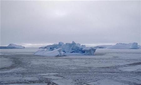 
An iceberg floats in the sea ice near the town of Uummannaq in western Greenland March 18, 2010. REUTERS/Svebor Kranjc
