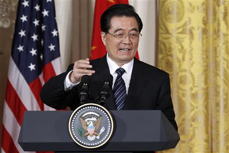 Chinese President Hu Jintao speaks during his joint news conference with U.S. President Barack Obama in the East Room of the White House in Washington, January 19, 2011. REUTERS/Jim Young
Chinese President Hu Jintao speaks during his joint news conference with U.S. President Barack Obama in the East Room of the White House in Washington, January 19, 2011. REUTERS/Jim Young