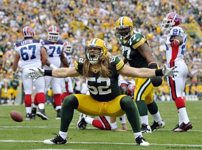 Packers linebacker Clay Matthews posing for the fans during a game at Lambeau Field against the Bills in Week 2 of the 2010 season, September 19th 2010. (courtesy to AP/Jim Prisching) Packers linebacker Clay Matthews posing for the fans during a game at Lambeau Field against the Bills in Week 2 of the 2010 season, September 19th 2010. (courtesy to AP/Jim Prisching)