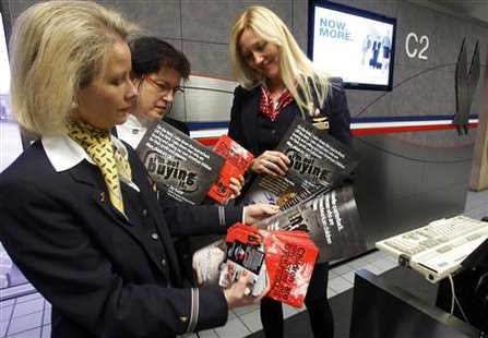 Flight attendants deliver educational materials about spotting sex-trafficking to a gate at the Dallas Fort Worth International Airport in Dallas, Texas, January 31, 2011 ahead of NFL's Super Bowl XLV to be played February 6. Pimps will traffic thousands of under-age prostitutes to Texas for Sunday's Super Bowl, hoping to do business with men arriving for the big game with money to burn, child rights advocates said. REUTERS/Brian Snyder
Flight attendants deliver educational materials about spotting sex-trafficking to a gate at the Dallas Fort Worth International Airport in Dallas, Texas, January 31, 2011 ahead of NFL's Super Bowl XLV to be played February 6. Pimps will traffic thousands of under-age prostitutes to Texas for Sunday's Super Bowl, hoping to do business with men arriving for the big game with money to burn, child rights advocates said. REUTERS/Brian Snyder
