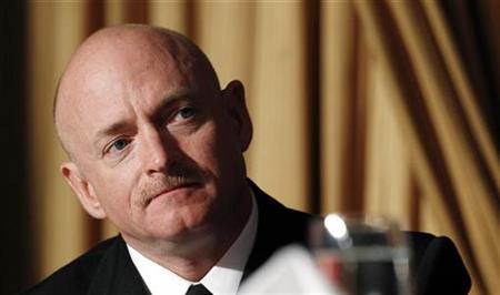 Astronaut Mark Kelly, husband of wounded U.S. Congresswoman Gabrielle Giffords (D-AZ), listens to U.S. President Barack Obama speak at the National Prayer Breakfast in Washington February 3, 2011. REUTERS/Kevin Lamarque
Astronaut Mark Kelly, husband of wounded U.S. Congresswoman Gabrielle Giffords (D-AZ), listens to U.S. President Barack Obama speak at the National Prayer Breakfast in Washington February 3, 2011. REUTERS/Kevin Lamarque
