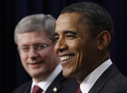 U.S. President Barack Obama (R) and Canadian Prime Minister Stephen Harper attend a joint news conference in the Eisenhower Executive Office Building in Washington, February 4, 2011. REUTERS/Jim Young
U.S. President Barack Obama (R) and Canadian Prime Minister Stephen Harper attend a joint news conference in the Eisenhower Executive Office Building in Washington, February 4, 2011. REUTERS/Jim Young