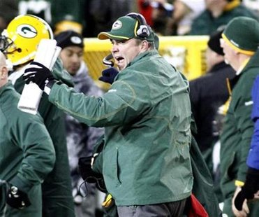 Green Bay Packers head coach Mike McCarthy reacts after a play against the New York Giants in the second half of their NFL football game in Green Bay, Wisconsin December 26, 2010. REUTERS/Darren Hauck
Green Bay Packers head coach Mike McCarthy reacts after a play against the New York Giants in the second half of their NFL football game in Green Bay, Wisconsin December 26, 2010. REUTERS/Darren Hauck