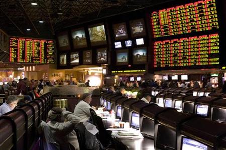 Proposition bets (R) for Super Bowl XLV are posted at the race and sports book in the Las Vegas Hilton in Las Vegas, Nevada January 27, 2011. REUTERS/Las Vegas Sun/Steve Marcus
Proposition bets (R) for Super Bowl XLV are posted at the race and sports book in the Las Vegas Hilton in Las Vegas, Nevada January 27, 2011. REUTERS/Las Vegas Sun/Steve Marcus