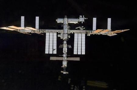 Backdropped by the blackness of space, the International Space Station is seen in this image taken by a crew member aboard the Space Shuttle Atlantis during rendezvous and docking activities in this photo released by NASA and taken November 18, 2009. REUTERS/NASA Handout
Backdropped by the blackness of space, the International Space Station is seen in this image taken by a crew member aboard the Space Shuttle Atlantis during rendezvous and docking activities in this photo released by NASA and taken November 18, 2009. REUTERS/NASA Handout